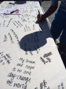 Alpha Students write their dreams on the "dream table."